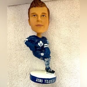 Blue and White Bobblehead Figurine Juri Tlusty